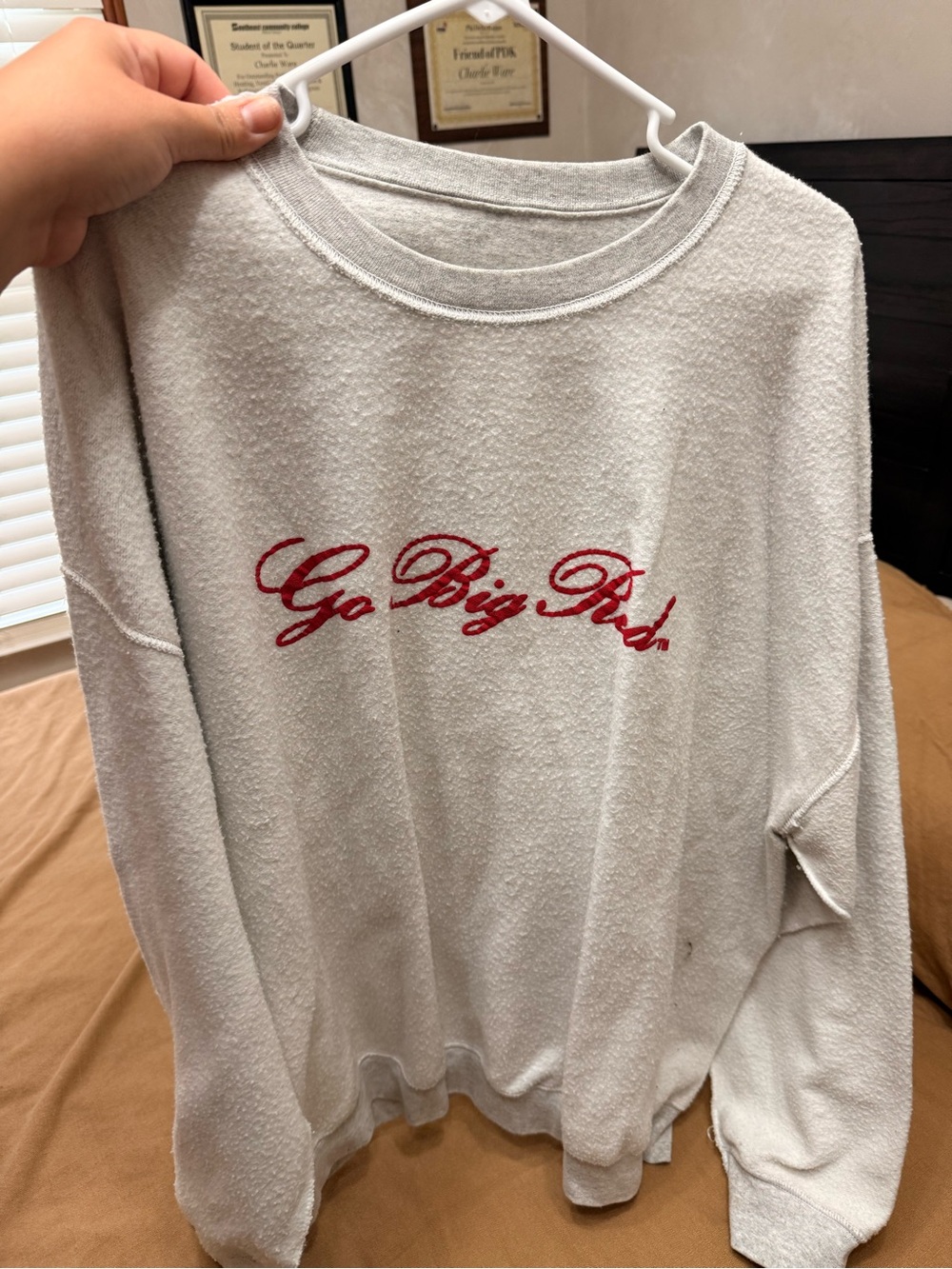 White Sweatshirt with Red Script 'Go Big Red'